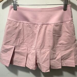 PUMA pink women’s golf skort, size Small